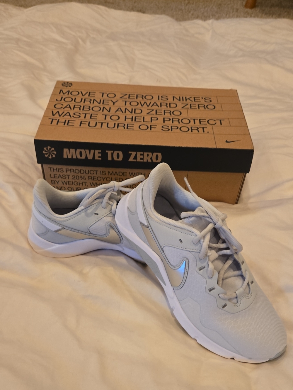 Nike Light Grey and White Move To Zero Sneakers